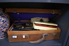 A selection of leather samples and similar haberdashery items in leather case