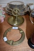 A vintage ships wheel styled ash tray