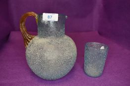 A Victorian frosted blue glass water jug and matching beaker