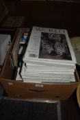 A selection of World magazine volumes and similar reference books