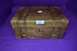 An antique sewing case or haberdashery box having straw work style decoration