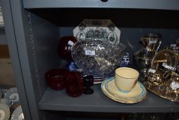 A selection of cranberry glass and ceramics including Clarice Cliff tea cup and queen Victoria