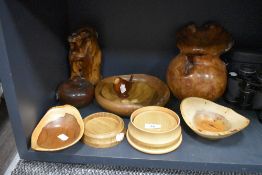 A selection of treen wood bowls and a large hand turned Elm burr vase