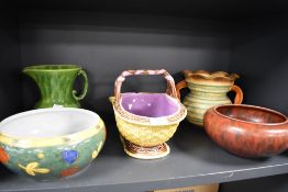 A selection of ceramics including Majolica fruit basket and art deco water jugs