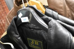 A vintage motor cycle jacket and similar waist coat