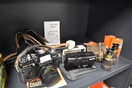 A selection of cameras including Zenit EM , Kodak instamatic 33 and Panorama