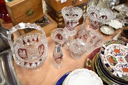 A selection of glass wares having cut etched and colour designs