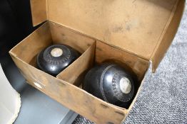 A boxed set of wooden Thomas Taylor Scotch bowls having been presented by Kirkby Lonsdale bowling