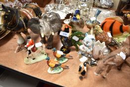 A selection of figures and figurines including Melba elephant, Beswick Donkey etc