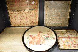 A collection of antique samplers, three having dates of 1825,1851 and 1878.
