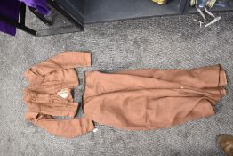 A Victorian two piece wool outfit comprising of jacket and skirt,some holes and mottling to fabric