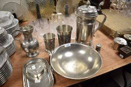 A fine selection of German pewter including Gegossen, twin handle footed bowl and large beer stein
