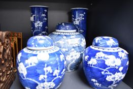 A selection of Chinese export porcelain including two tall stem vases, a large ginger jar and two