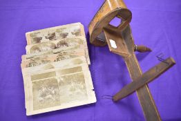 A late 19th/early 20th century 'The perfecscope' stereoscope and a collection of photographs