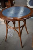 A vintage pub table having bentwood frame, diameter approx. 68cm