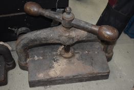 A large cast iron book press, width approx. 58cm