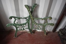 A set of traditional painted cast iron bench ends