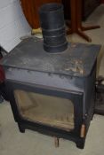 A traditional cast iron woodburner/multifuel stove, approx width 60cm, height 68cm (to flat top)