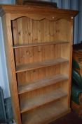 A natural pine bookshelf, height approx. 201cm, width 126cm
