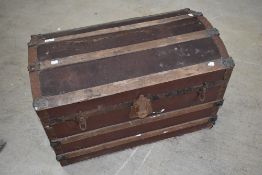 A vintage dome top travel trunk, width approx. 77cm