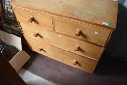 A stripped pine chest of two over two drawers, width approx. 92cm