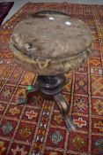 A Victorian mahogany tri legged piano stool having swivel top, nice upholstery project