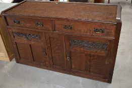 A Victorian oak sideboard or dresser base having later carpeted top, width approx. 136cm