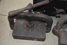 A cast iron book press, width approx. 40cm