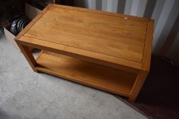 A modern oak effect coffee table , approx 100 x 55cm
