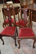 A harlequin set (two plus two) early 20th Century Queen Anne style mahogany vase back dining chairs