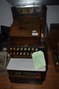 An early 20th Century oak cased till/cash register, labelled National