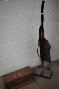 A 1940s Hoover vacuum cleaner and a selection of original tools