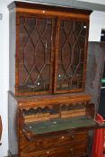 An Edwardian mahogany secretaire bookcase having astral glazed top with ebonised detailing , lower