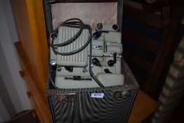 A vintage Eumig projector and screen