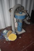 A commercial style bench mount belt sander and a dust extractor