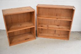 Two yellow pine bookshelves, width approx. 84cm and 66cm