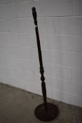 A traditional early to mid 20th Century standard lamp