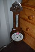 A late 19th/early 20th Century oak cased barometer