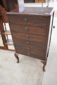 An early 20th Century mahogany six drawer music cabinet on cabriole legs, width approx. 50cm