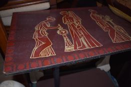 A vintage coffee table in the Piper style, having Greco-Romanesque decoration, approx. 115 x 38cm