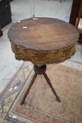 A 19th Century gipsy table having turned mahogany legs, diameter approx. 46cm