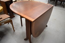 A vintage teak sutherland style drop leaf table, possibly Nathan or G Plan