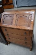 A mid to late 20th Century stained frame bureau