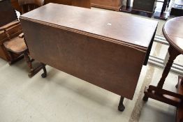 A mahogany gateleg table in the Queen Anne style
