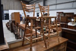 Two stained frame bar stools