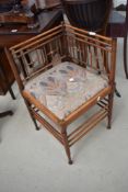 A 19th Century simulate bamboo having later William Morris style upholstered seat