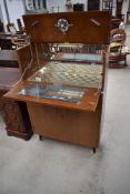 A mid 20th Century oak cocktail cabinet, with presentation plaque, Arley Miners