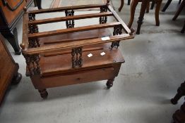 A 19th Century mahogany canterbury having bobbin spindle frame (top frame loose)