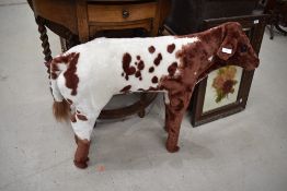 A modern decorative plush 'cow' height approx. 70cm