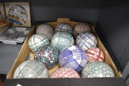 A selection of twelve Scottish pottery carpet bowls in various designs